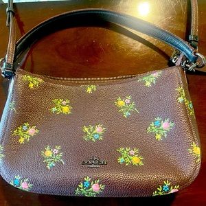 Coach brown purse with flowers  🌸 🍃